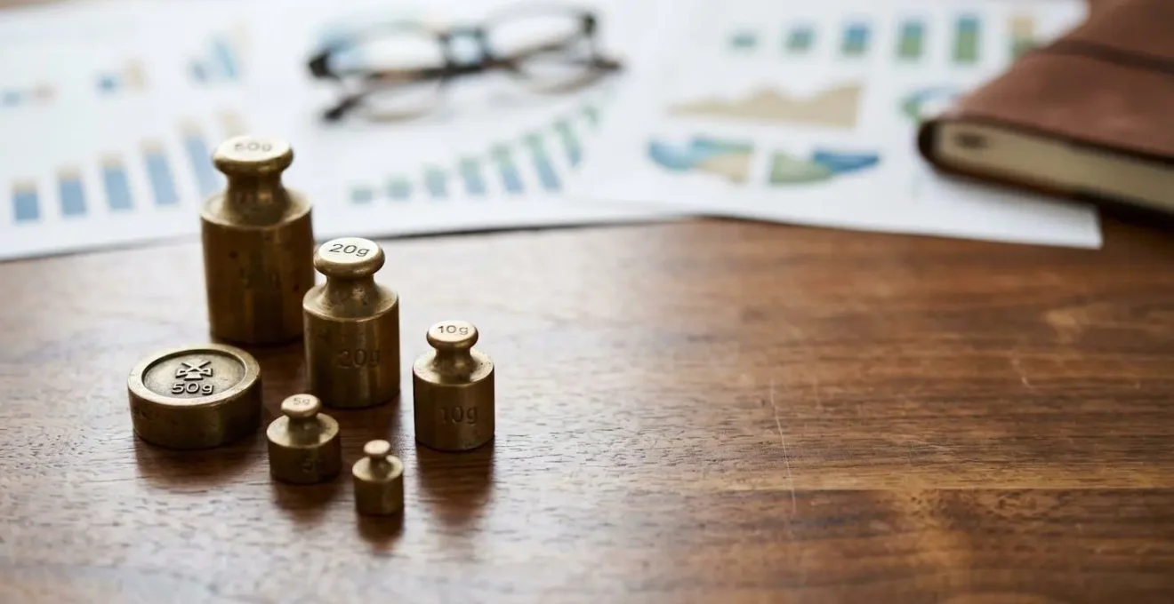 Professional editorial photograph showing financial portfolio balance and quarterly rebalancing strategy concept
